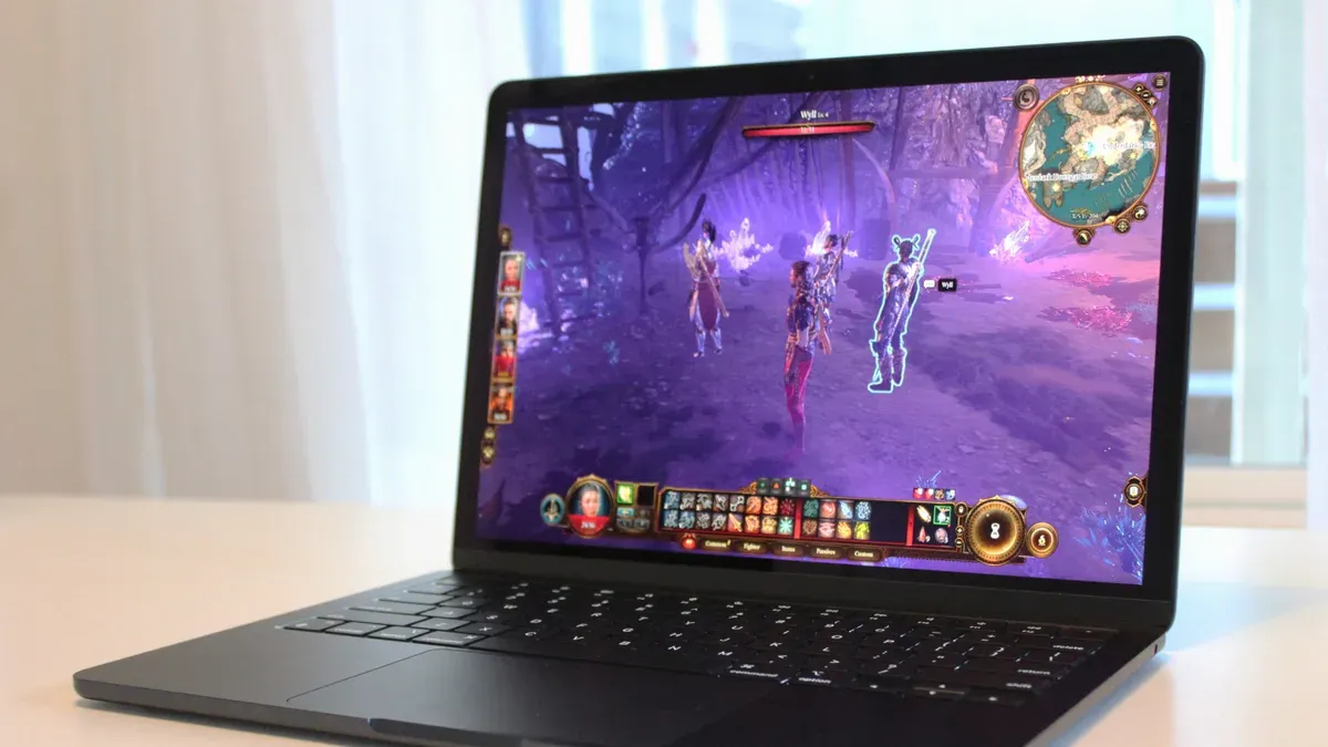 MacBook Air M3 running Baldur's Gate 3 showing gameplay on screen