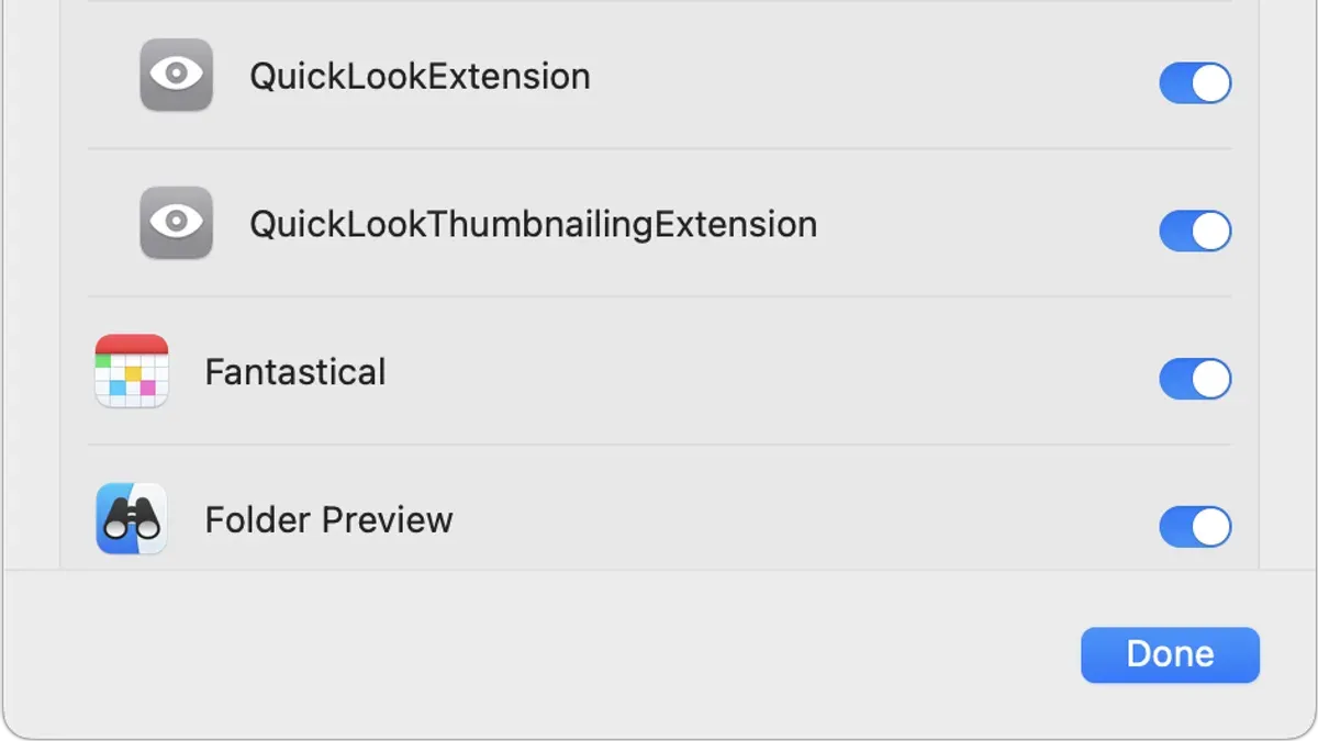 Mac user previewing files with Quick Look in Finder on a laptop screen
