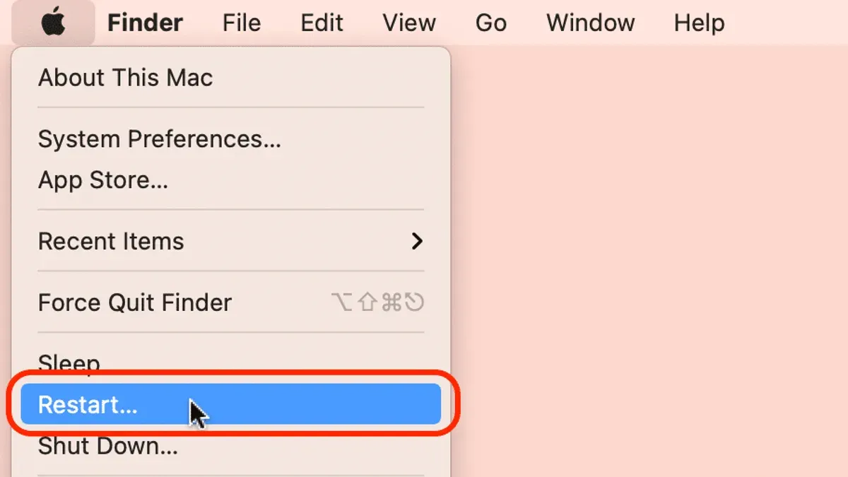 Person restarting MacBook Pro M1 Pro showing the process clearly