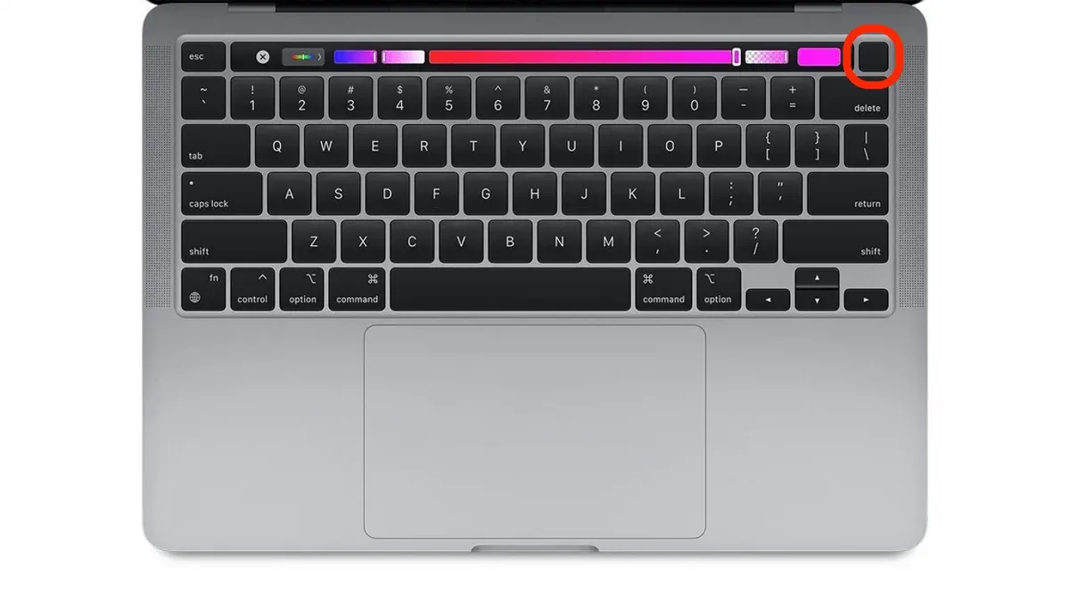 Person safely turning off on MacBook Pro M1 Pro using the Apple menu