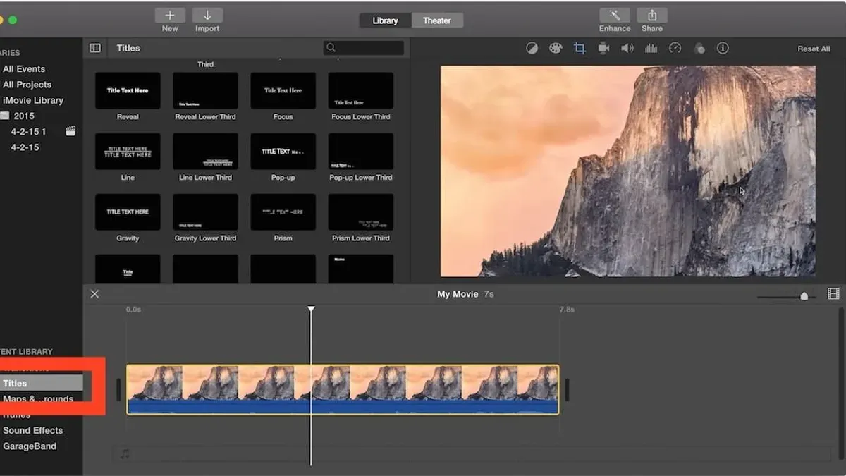 Person adding subtitles in iMovie on MacBook screen