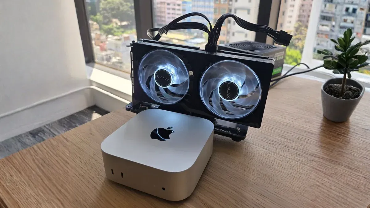 Mac laptop connected to external GPU setup boosting graphics performance