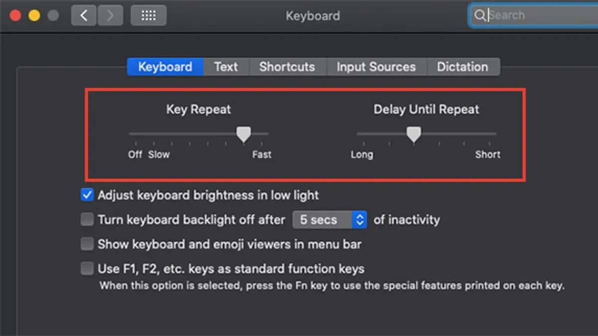 Person adjusting keyboard key repeat speed on Mac in system settings