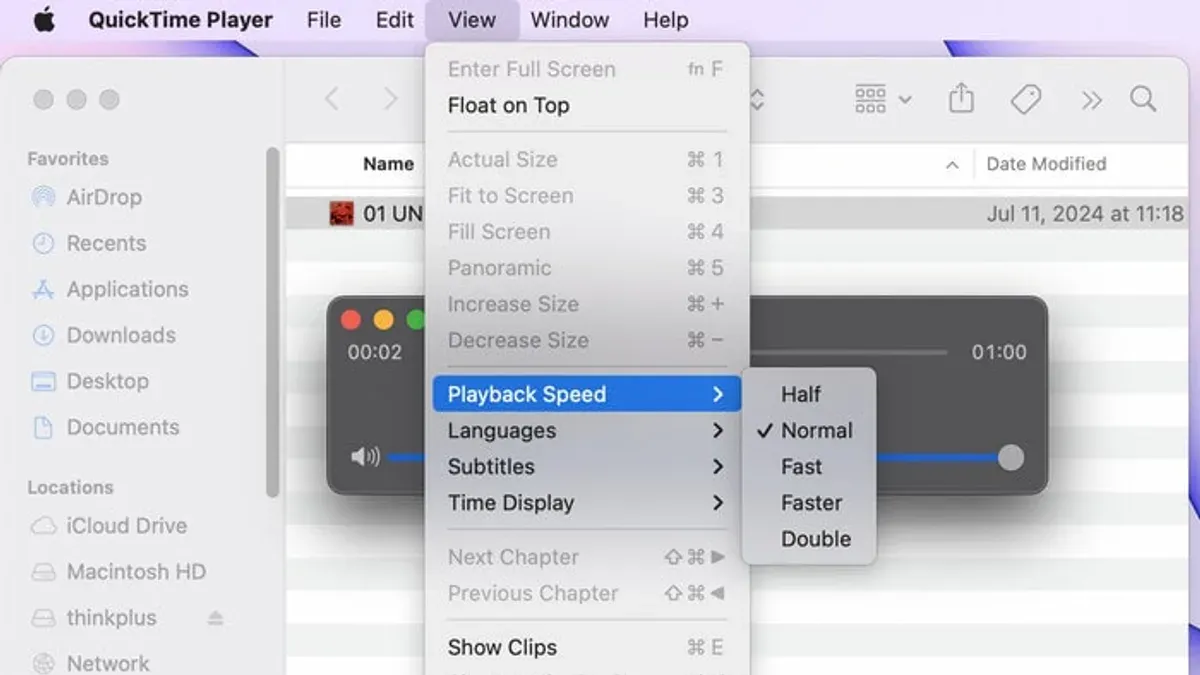 How to change playback speed in QuickTime Player on a MacBook screen