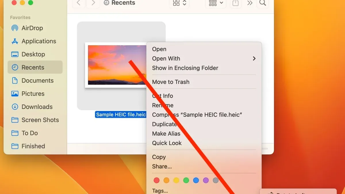 How to convert HEIC to JPG on Mac shown on MacBook screen with image files