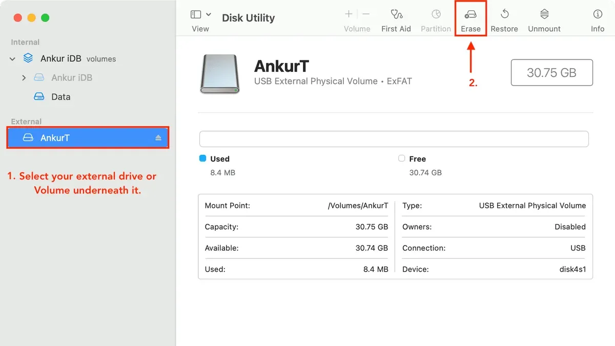 Person erasing a drive in Disk Utility on a MacBook screen