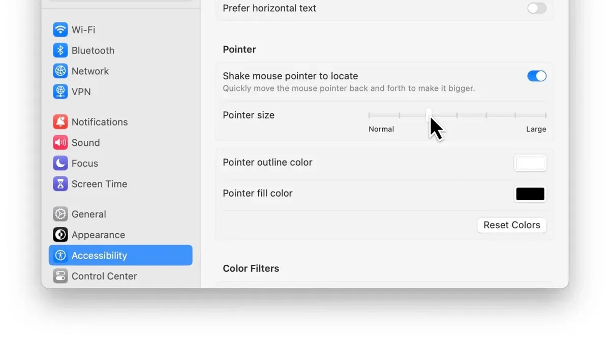 Mac screen with enlarged cursor demonstrating how to increase cursor size on Mac