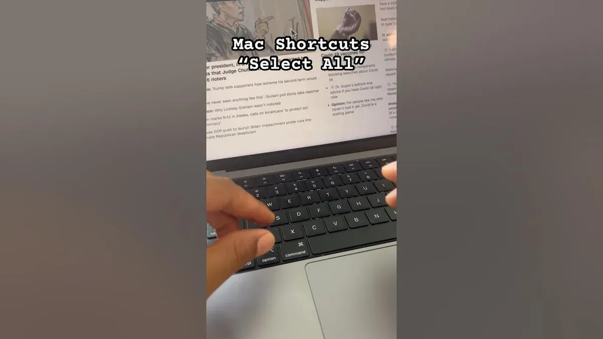 Mac keyboard shortcut to select all files demonstrated on a laptop screen