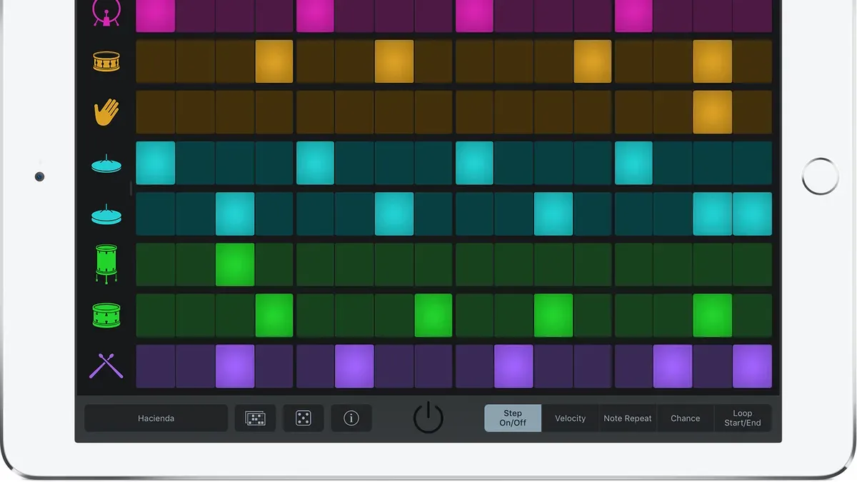Person making a hip hop beat in GarageBand on a laptop