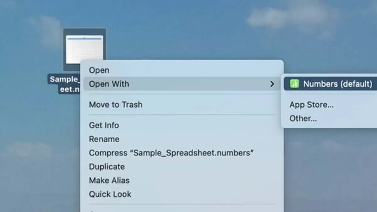 Person opening a.numbers file on MacBook showing spreadsheet content on screen