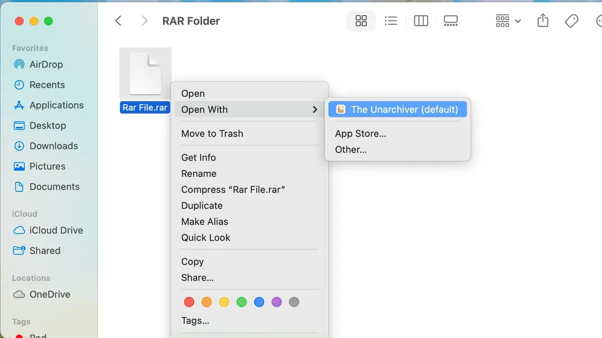 MacBook screen showing how to open.rar file on Mac with extraction software