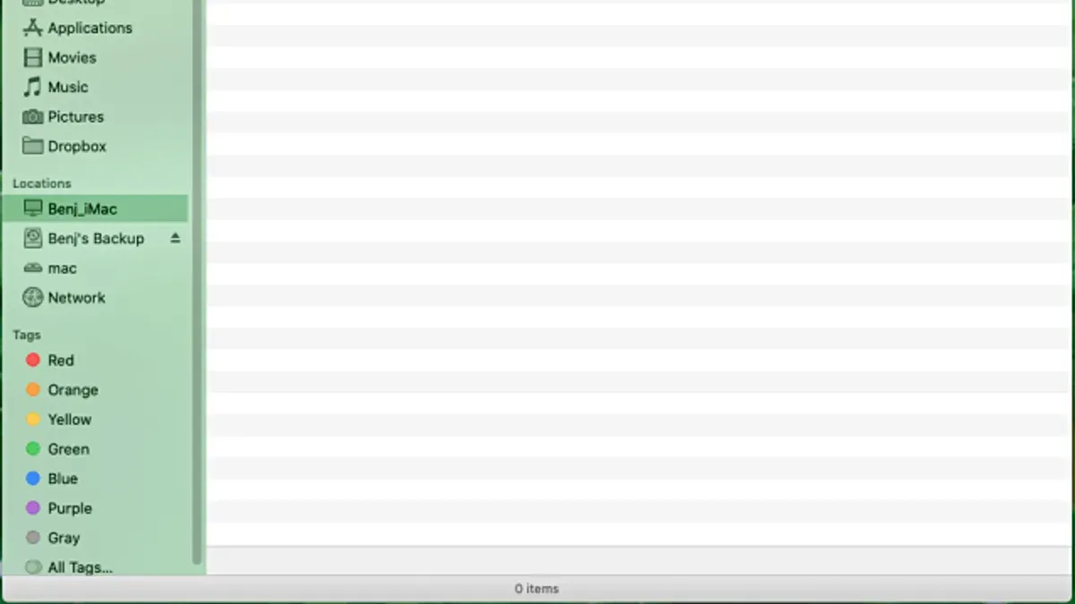 Mac laptop screen showing how to open.torrent file on Mac with torrent client interface