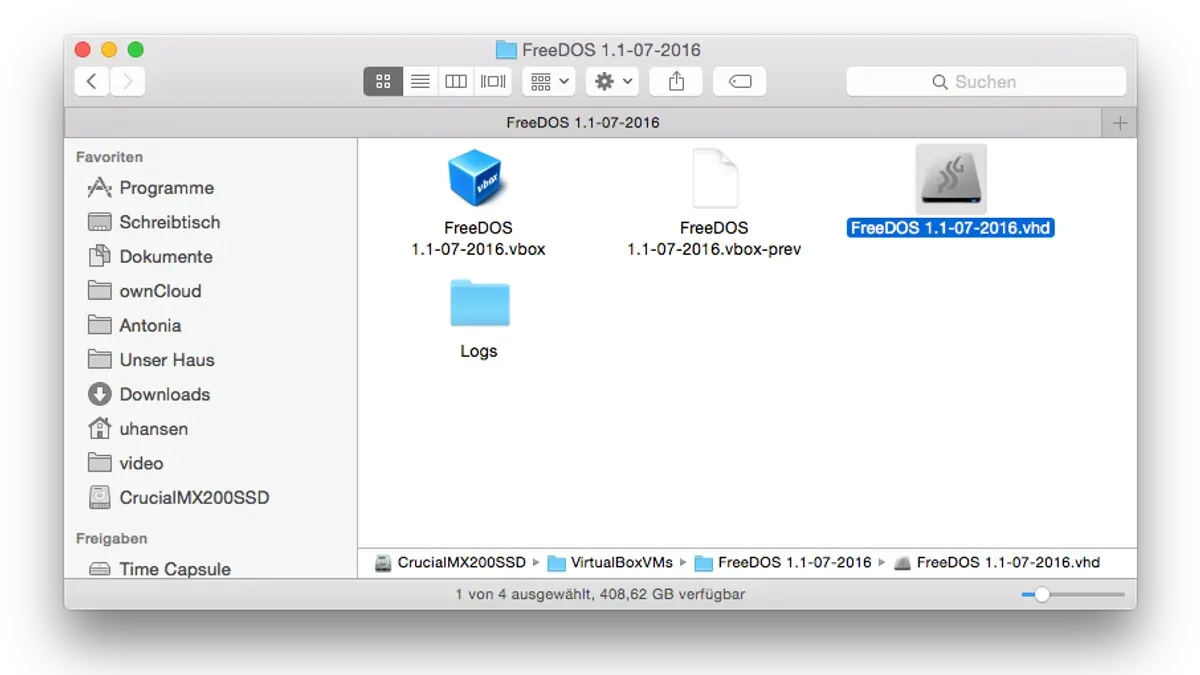 MacBook showing how to open.vhd file on Mac with virtualization software