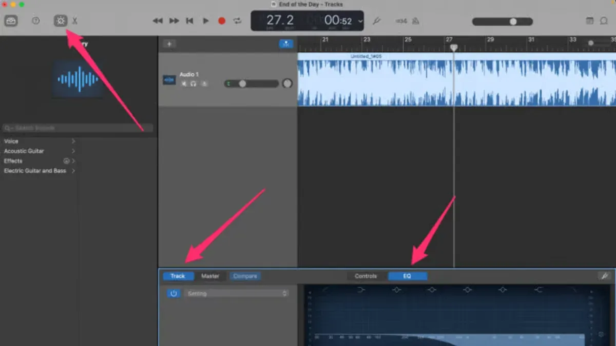Person removing vocals from a song in GarageBand on laptop with headphones