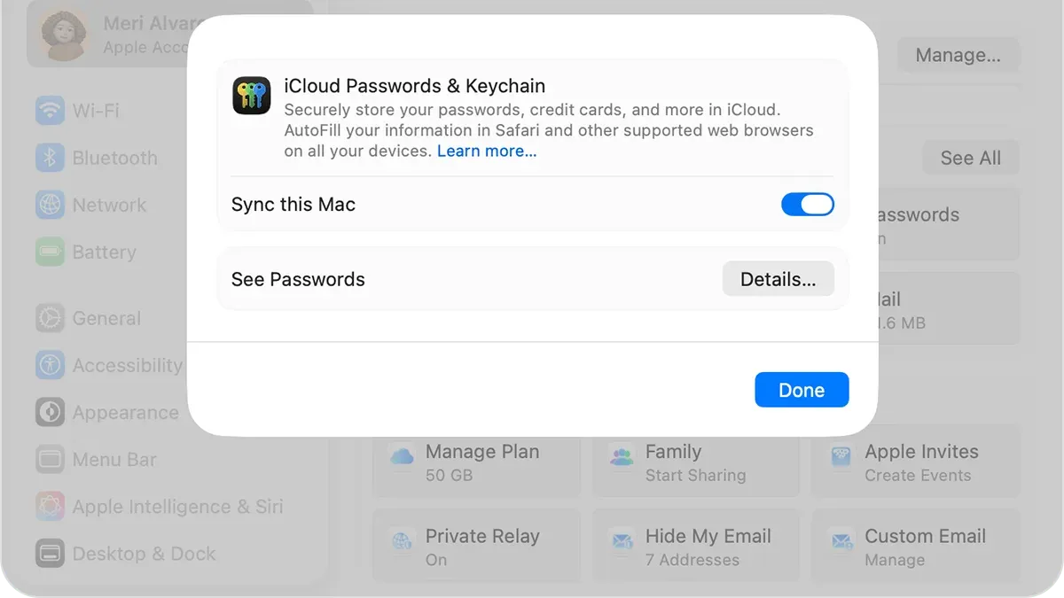 Person setting up iCloud Keychain on Mac laptop showing password sync setup