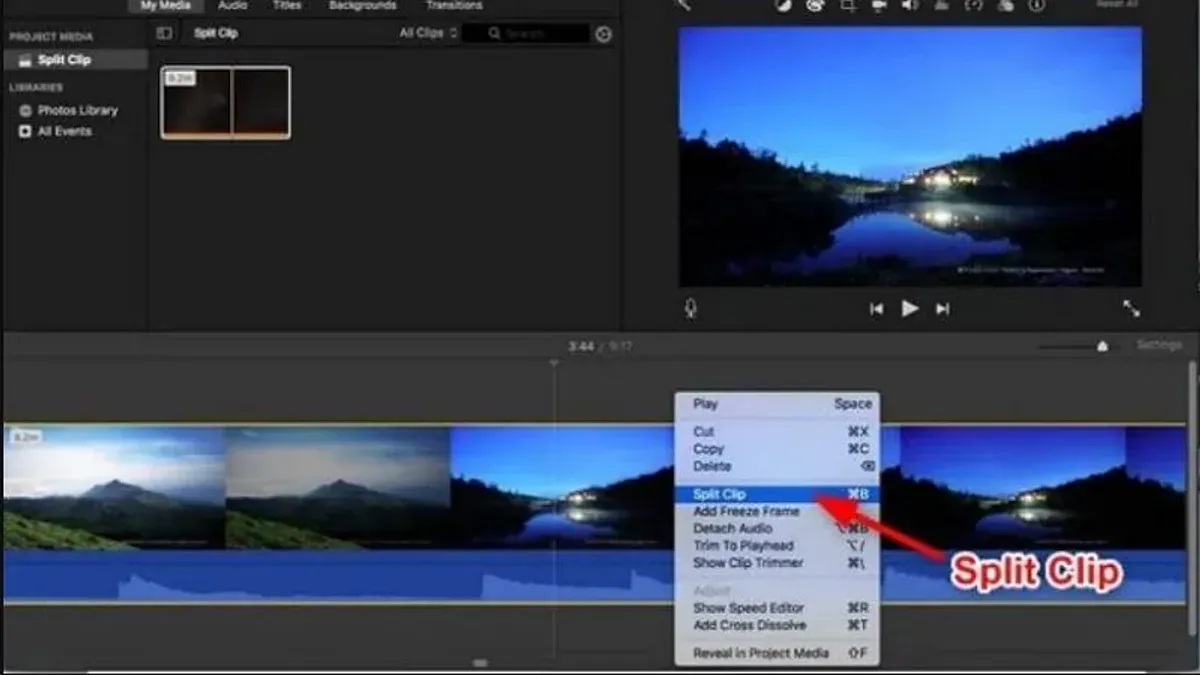 User splitting a clip in iMovie on a laptop for precise video editing