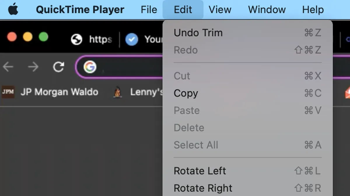 User trimming a video in QuickTime Player on a MacBook screen