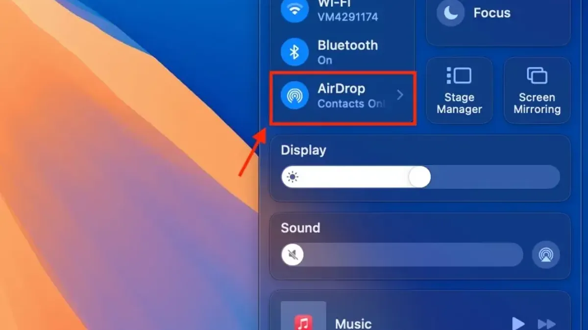How to turn on AirDrop for everyone on Mac shown on a MacBook screen