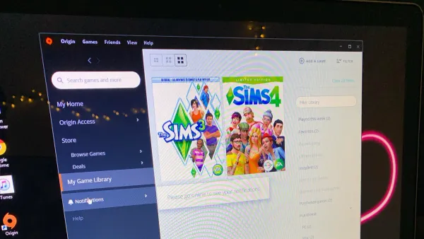 MacBook Air M3 running The Sims 4 showing gameplay on screen