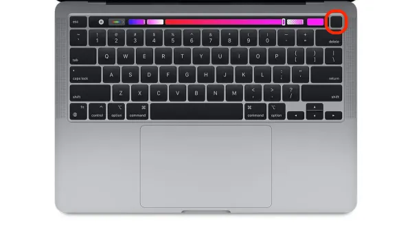 Person safely turning off on MacBook Pro M1 Pro using the Apple menu