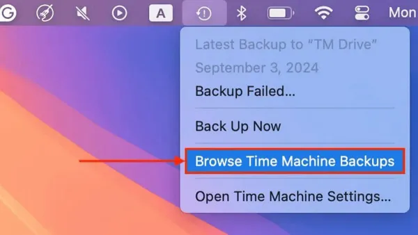 User browsing old backups in Time Machine on a MacBook screen