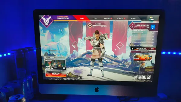 Person playing Apex Legends on iMac M4 gaming setup