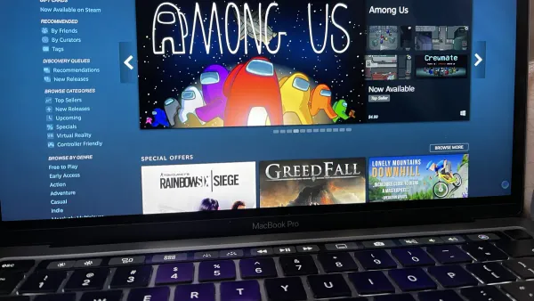 Mac user playing games on Steam client on a MacBook