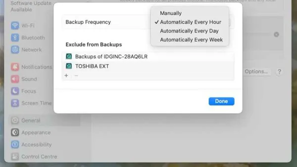 MacBook screen displaying how to change backup frequency in Time Machine settings