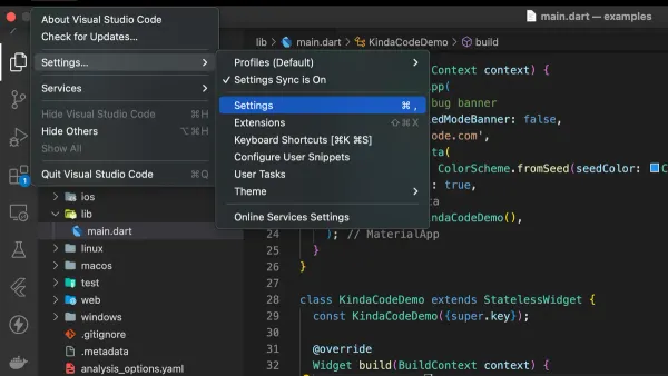 How to change font size in VS Code on Mac shown on MacBook screen