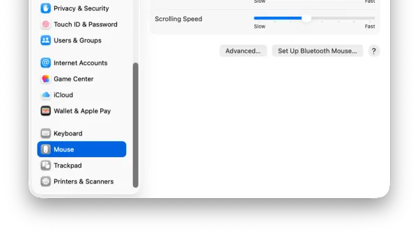 How to change the mouse scroll direction on Mac shown on a Mac laptop screen with mouse in hand