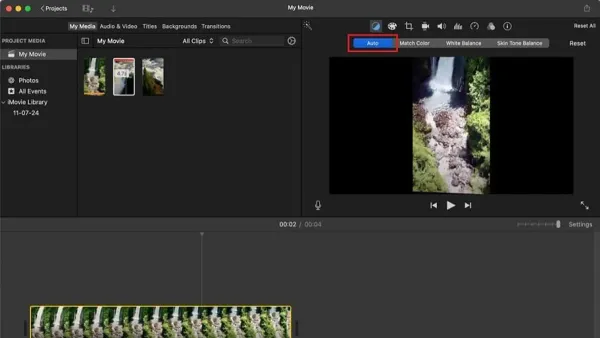Person using iMovie to color correct a clip on a laptop screen