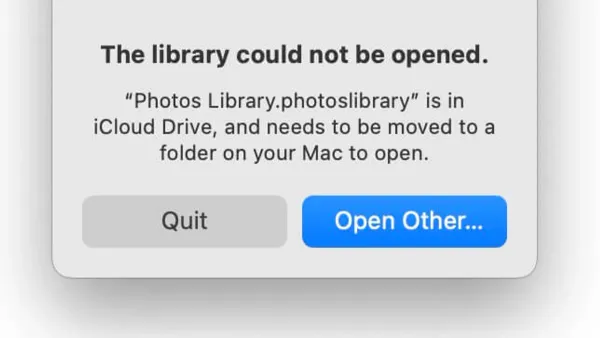 Person fixing library not opening in Photos app on smartphone