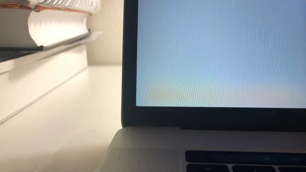 MacBook Pro M1 Pro display showing a noticeable yellow tint on screen