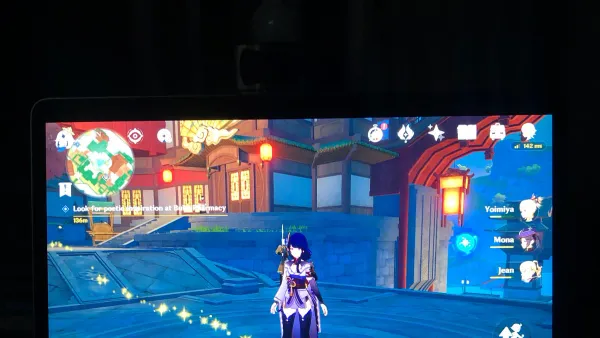 iMac M4 running Genshin Impact game showing gameplay on screen