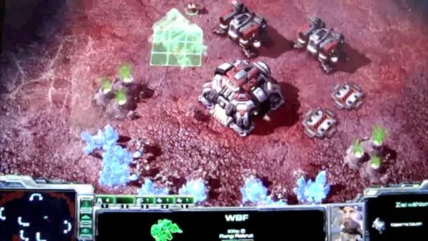iMac M4 displaying Starcraft 2 gameplay, showing compatibility and performance