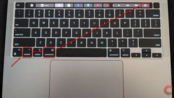 Mac keyboard shortcut to restart Mac shown on a MacBook with frozen screen