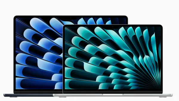MacBook Air 15 inch M5 connected to external displays showing workspace setup