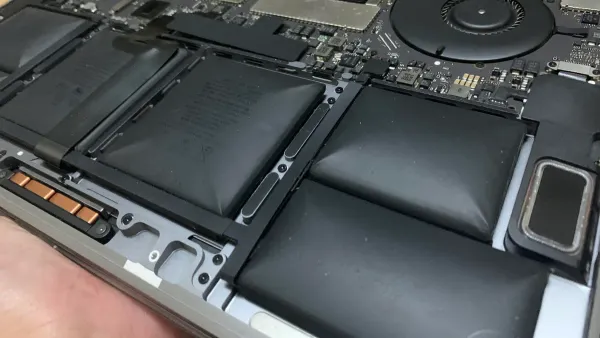 MacBook Pro M1 Pro battery swelling causing bulging bottom case
