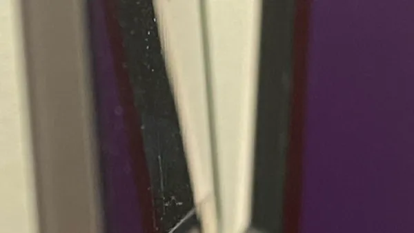 Close-up of MacBook Pro M1 Pro hinge showing signs of hinge issues