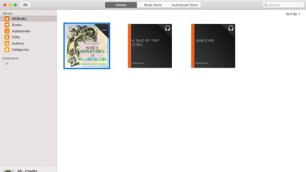 Person opening and playing how to open.m4b file on Mac audiobook on MacBook with headphones
