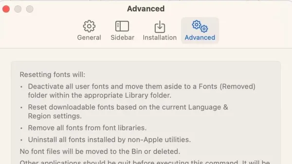 Screen showing how to reset fonts to default in Font Book on a MacBook