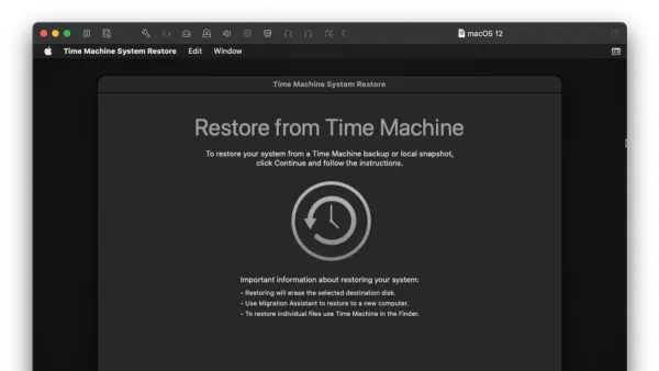 Person restoring an entire Mac in Time Machine using a laptop