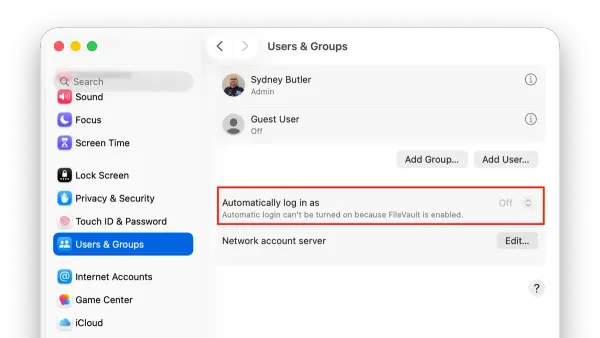 Person setting how to set auto login on Mac on a MacBook screen