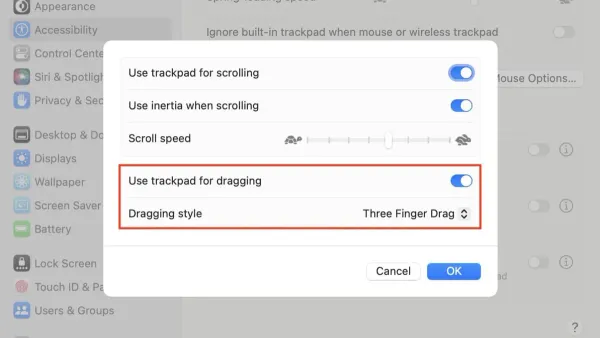 User demonstrating how to turn on three finger drag on Mac trackpad