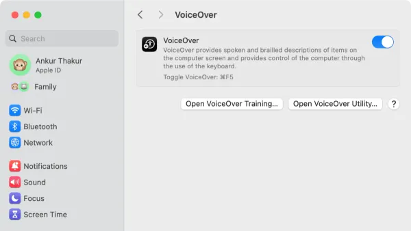 User navigating MacBook screen using VoiceOver on Mac for accessibility
